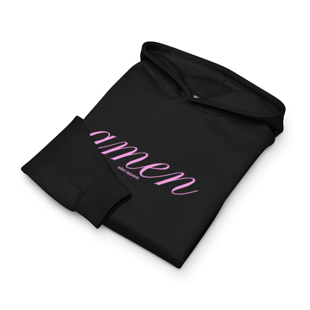 Black folded hoodie with pink 'amen' text on a white background